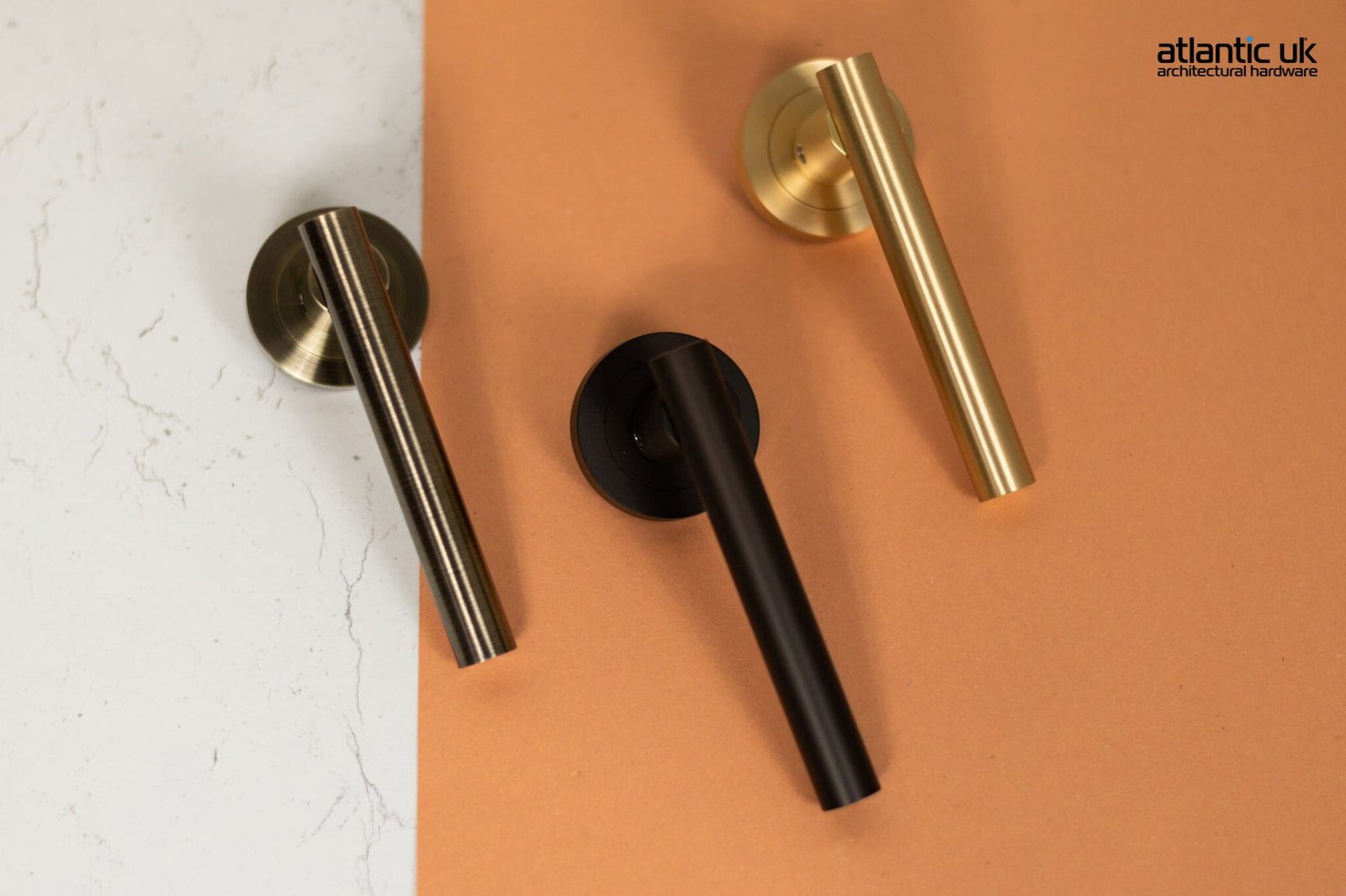 STATUS Nebraska Lever Door Handle on Round Rose in Urban Dark Bronze Lever Door Handle Atlantic