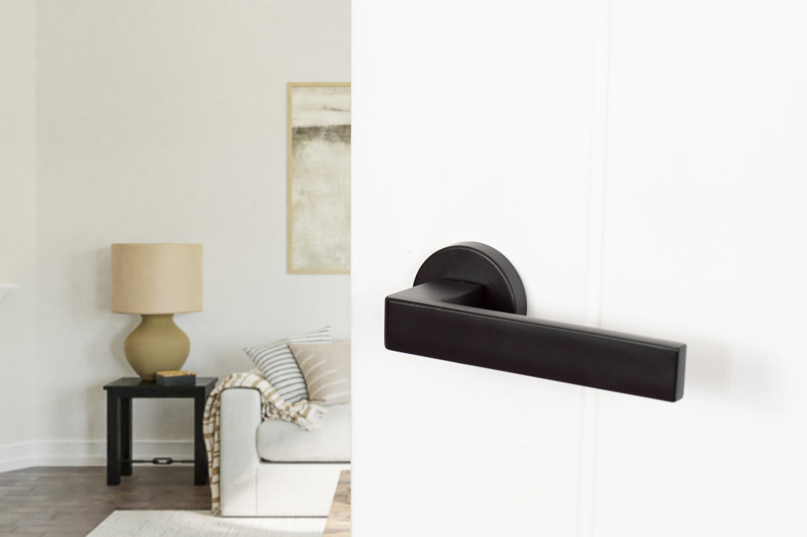 Forme Asti Designer Lever Minimal Round Rose in Matt Black Designer Lever Handle Atlantic