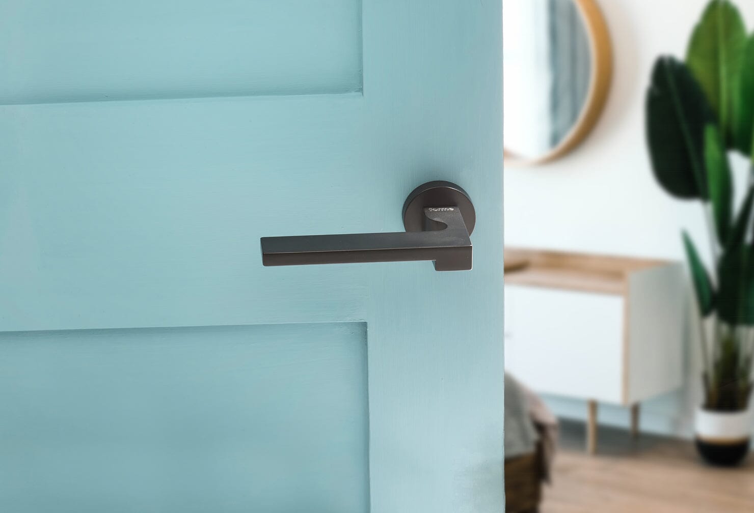 Forme Ginevra Designer Lever Minimal Round Rose in Matt Black Designer Lever Handle Atlantic
