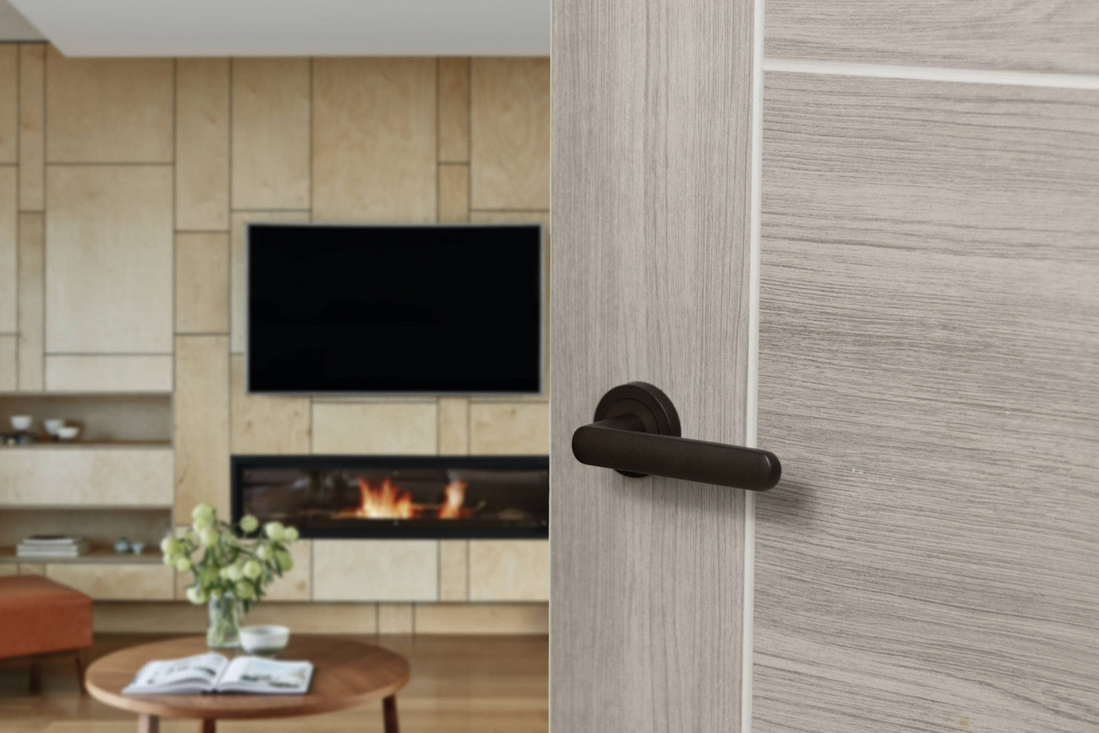 STATUS Carolina Lever Door Handle on Round Rose in Urban Dark Bronze Lever Door Handle Atlantic