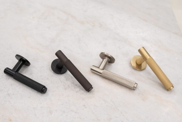 Millhouse Brass Crompton Designer Lever 5mm Slimline Round Rose in Matt Black Designer Lever Handle Atlantic 