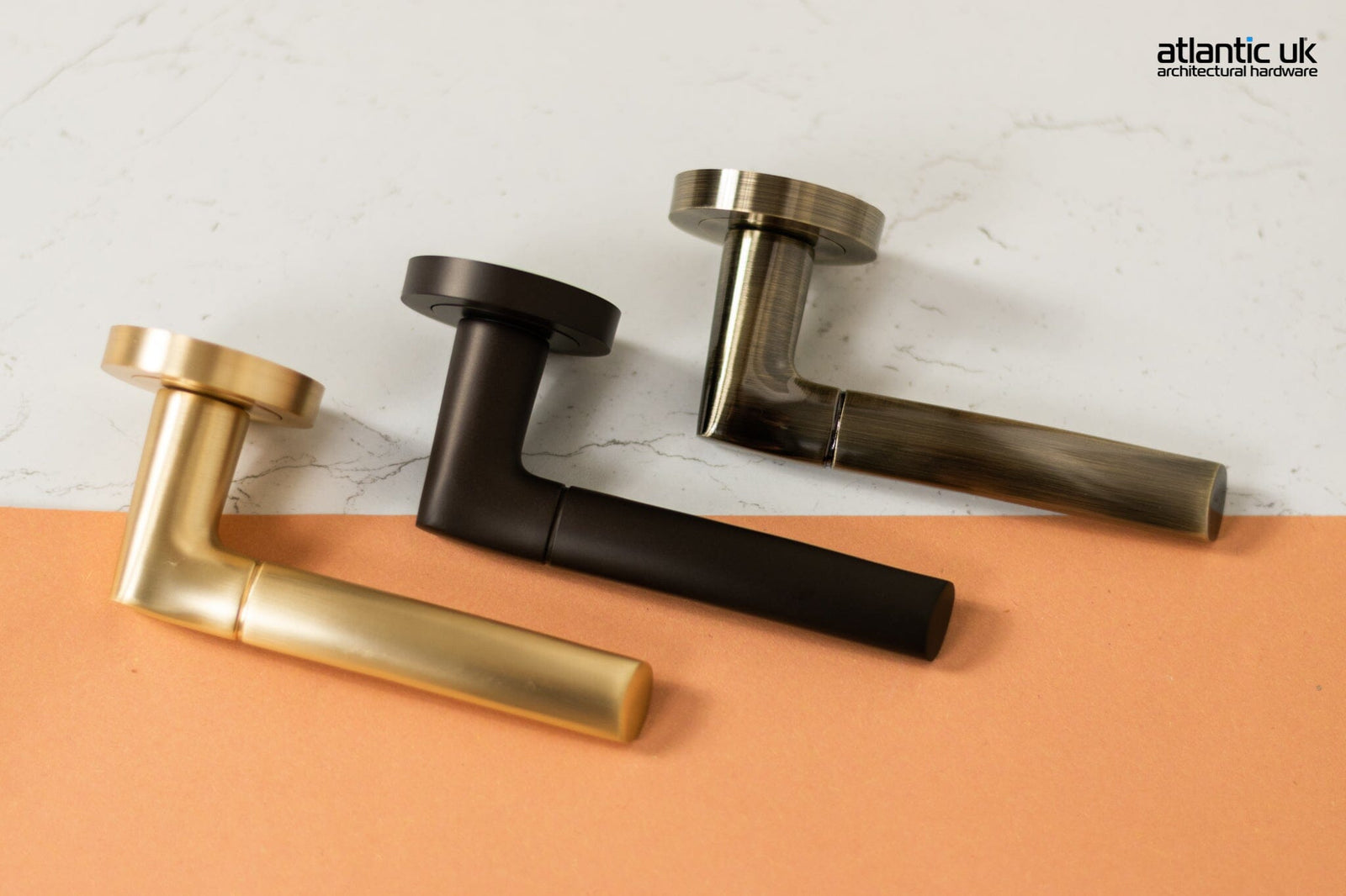 STATUS Indiana Lever Door Handle on Round Rose in Satin Brass Lever Door Handle Atlantic 