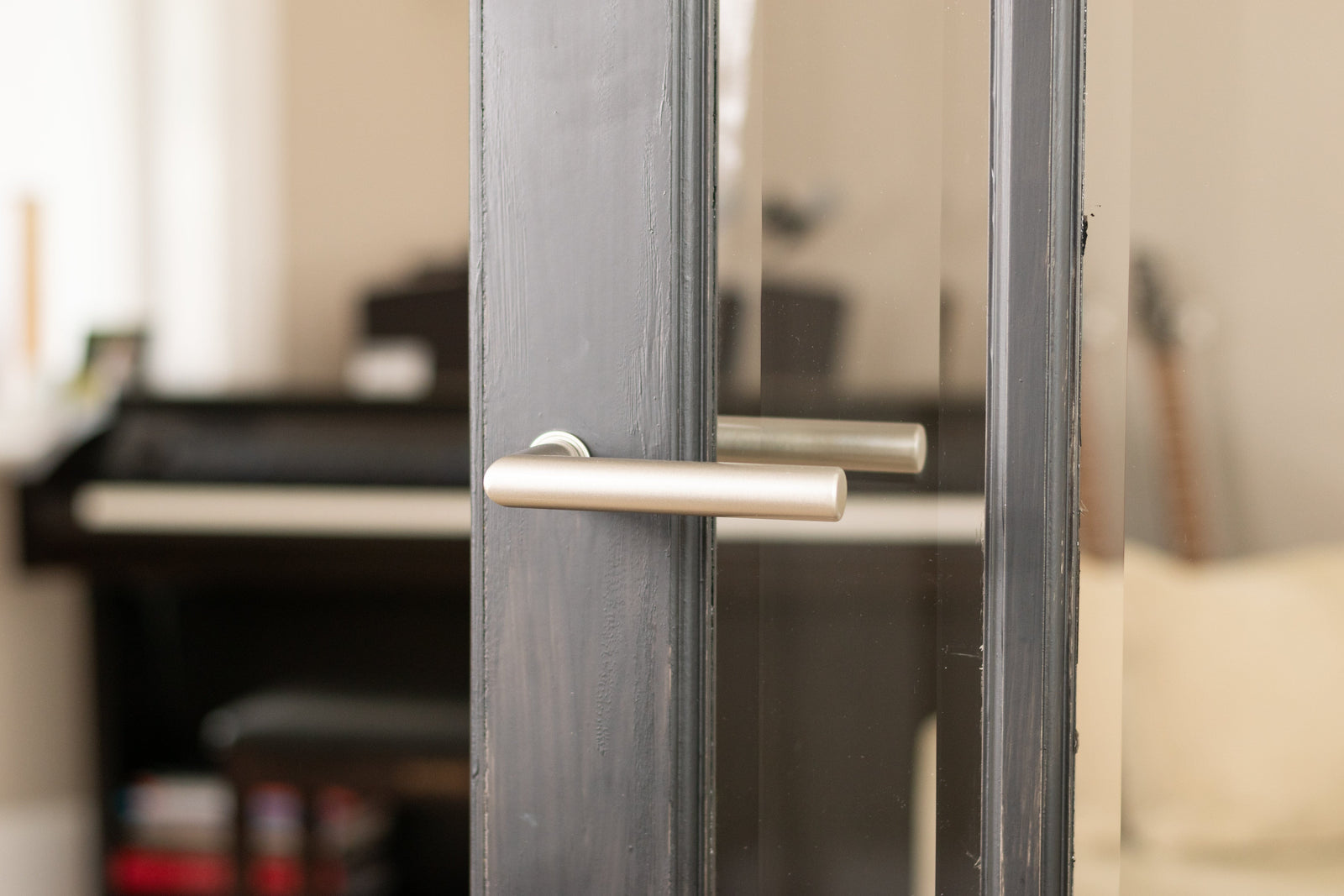 Forme Elle Lever Door Handle on Concealed Round Rose in Urban Dark Bronze 10 x 5 x 10cm in Urban Dark Bronze Designer Lever Handle Atlantic 