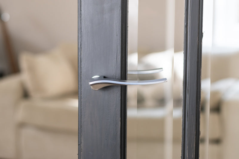 Forme Olimpia Lever Door Handle on Concealed Round Rose in Satin Chrome