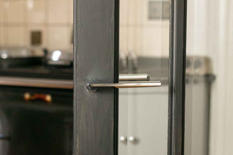 Forme Boston Lever Door Handle on Concealed Round Rose in Matt Black