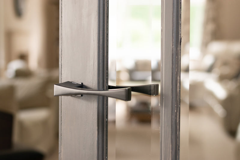 Forme Artemide Lever Door Handle on Concealed Square Rose in Matt Black