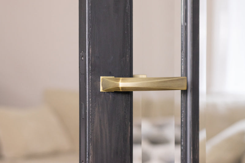 Forme Crystal Lever Door Handle on Concealed Square Rose in Yester Bronze