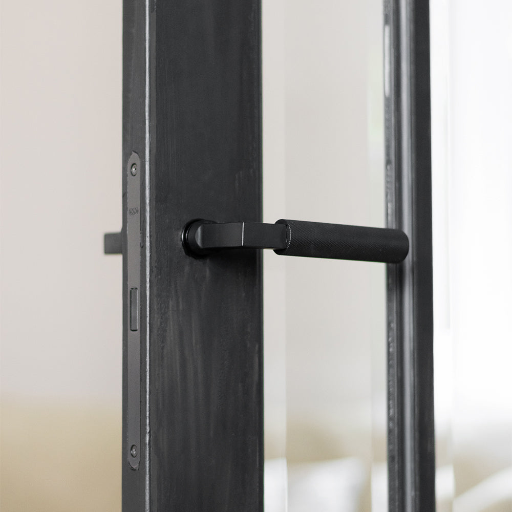 Millhouse Brass Cartwright Lever Door Handle on Concealed Round Rose