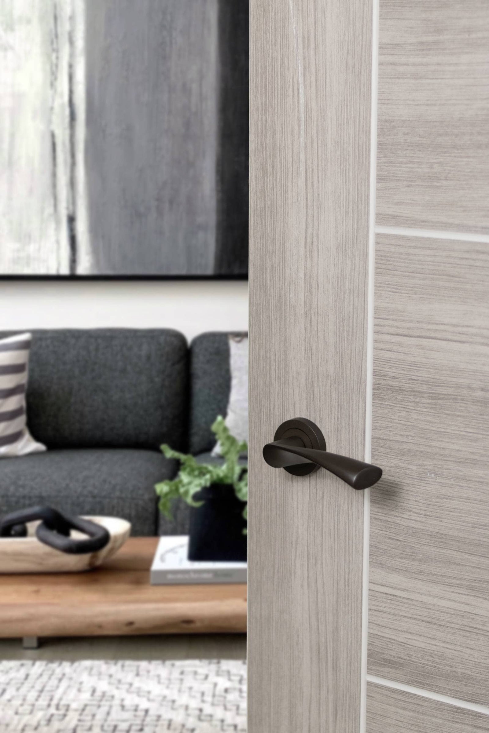 STATUS Colorado Lever Door Handle on Round Rose in Urban Dark Bronze Lever Door Handle Atlantic 