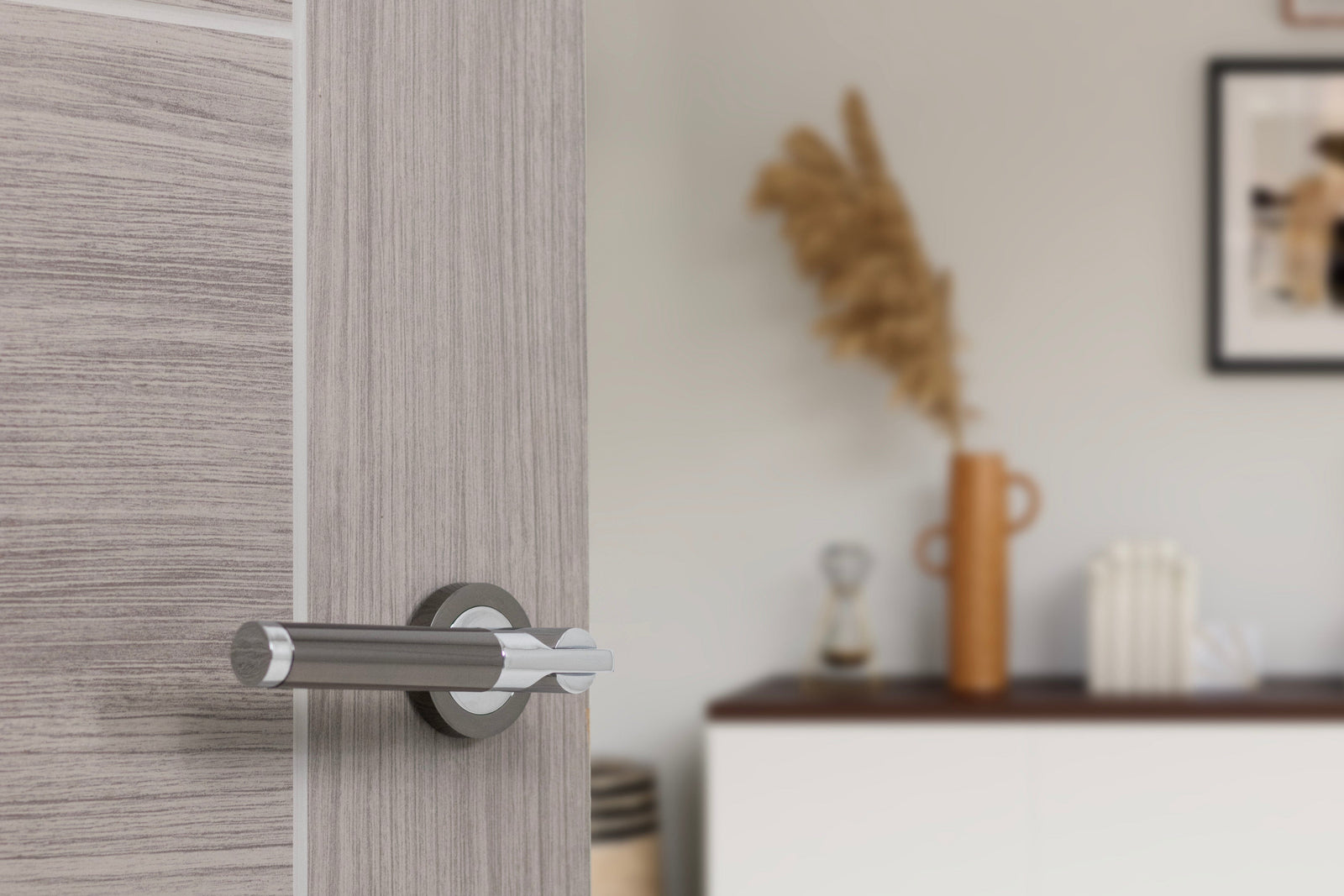 Status Dakota Lever Round Rose in Black Nickel/Polished Chrome Lever on Round Rose Atlantic 