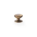 Waltz Round Cupboard Knob on Stepped Rose 25mm Cupboard Knob Alexander & Wilks Antique Brass 