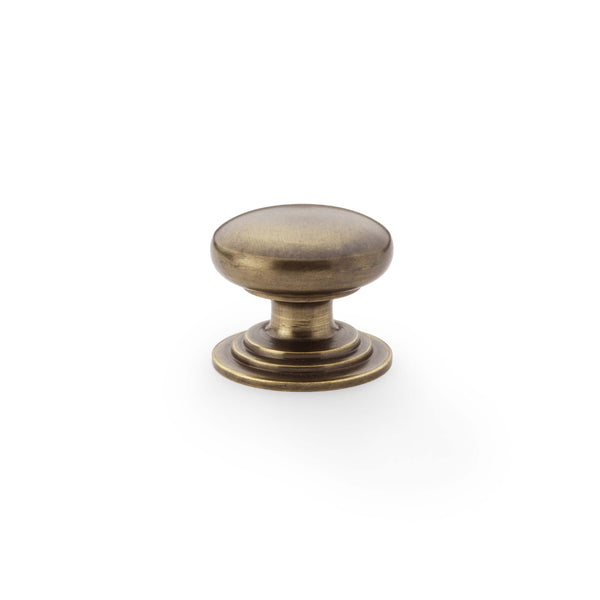 Waltz Round Cupboard Knob on Stepped Rose 32mm Antique Brass AW825-32-AB