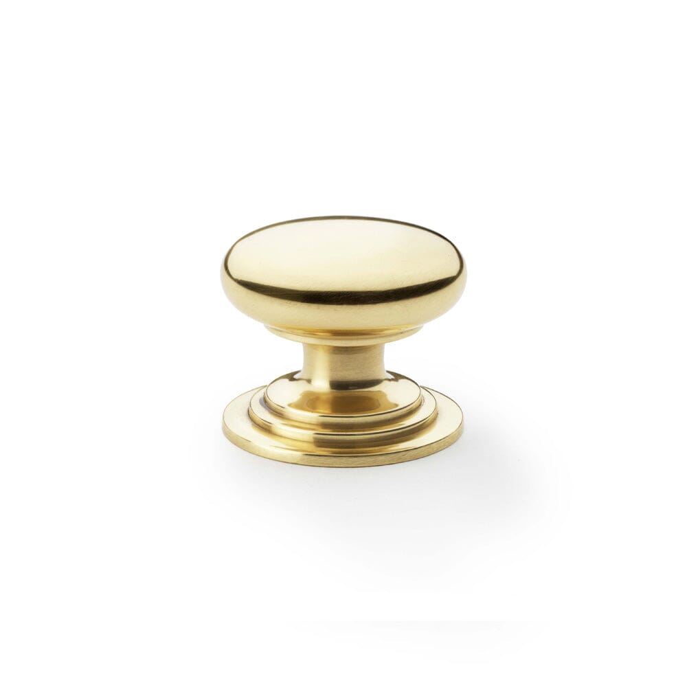 Waltz Round Cupboard Knob on Stepped Rose 38mm Cupboard Knob Alexander & Wilks Polished Brass Lacquered 
