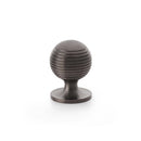 Caesar Cupboard Knob on Round Rose 32mm Cupboard Knob Alexander & Wilks Dark Bronze PVD 